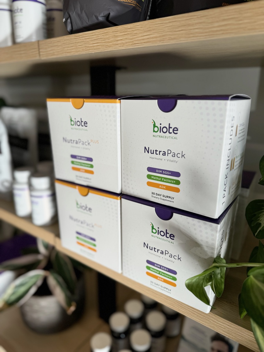 Hormone and vitality support packs on the shelf at Mana Wellness